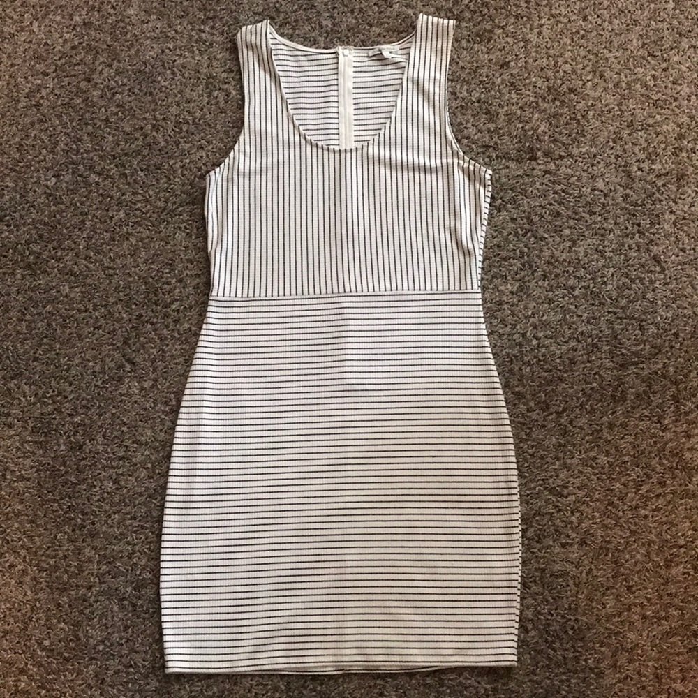 Bodycon style black and off white striped dress.